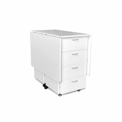 White Kookaburra Cutting Table (K3451) from Kangaroo Sewing Furniture closed down to small footprint on rolling casters